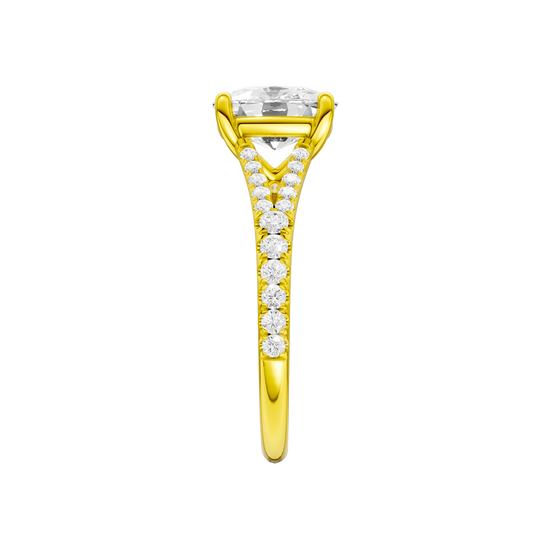 A side view of the Elongated Cushion cut diamond engagement ring in 14k yellow gold with a prong band and solitaire setting