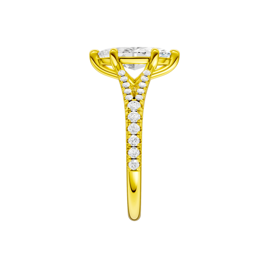 A side view of the Marquise cut diamond engagement ring in 14k yellow gold with a prong band and solitaire setting