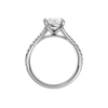 A profile view of the Oval cut diamond engagement ring in platinum with a prong band and solitaire setting