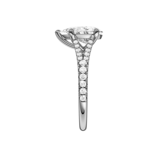 A side view of the Pear cut diamond engagement ring in platinum with a prong band and solitaire setting