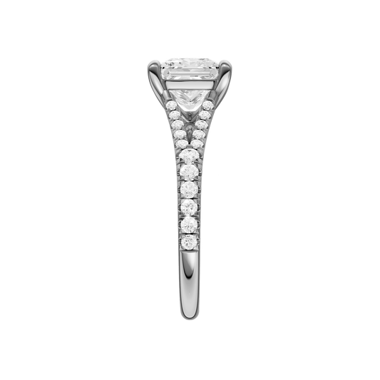 A side view of the Emerald cut diamond engagement ring in 14k white gold with a prong band and solitaire setting