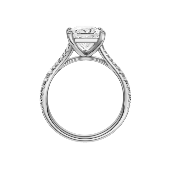 A profile view of the Emerald cut diamond engagement ring in 14k white gold with a prong band and solitaire setting