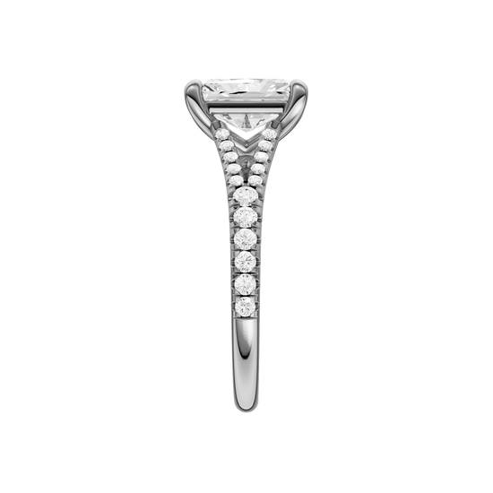 A side view of the Radiant cut diamond engagement ring in platinum with a diamond band and solitaire setting