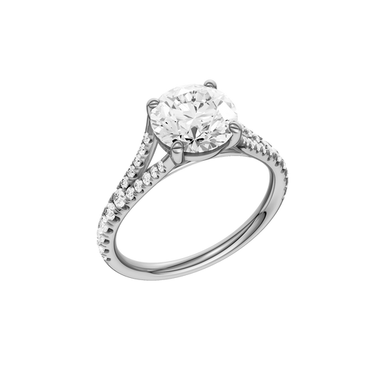A three-quarter view of the Round cut diamond engagement ring in platinum with a diamond band and solitaire setting