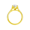 A profile view of the Round cut diamond engagement ring in 14k yellow gold with a diamond band and solitaire setting
