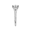 A side view of the Elongated Cushion cut diamond engagement ring in 14k white gold with a diamond band and hidden halo setting