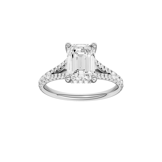 A front view of the Emerald cut diamond engagement ring in 14k white gold with a prong diamond band and hidden halo setting