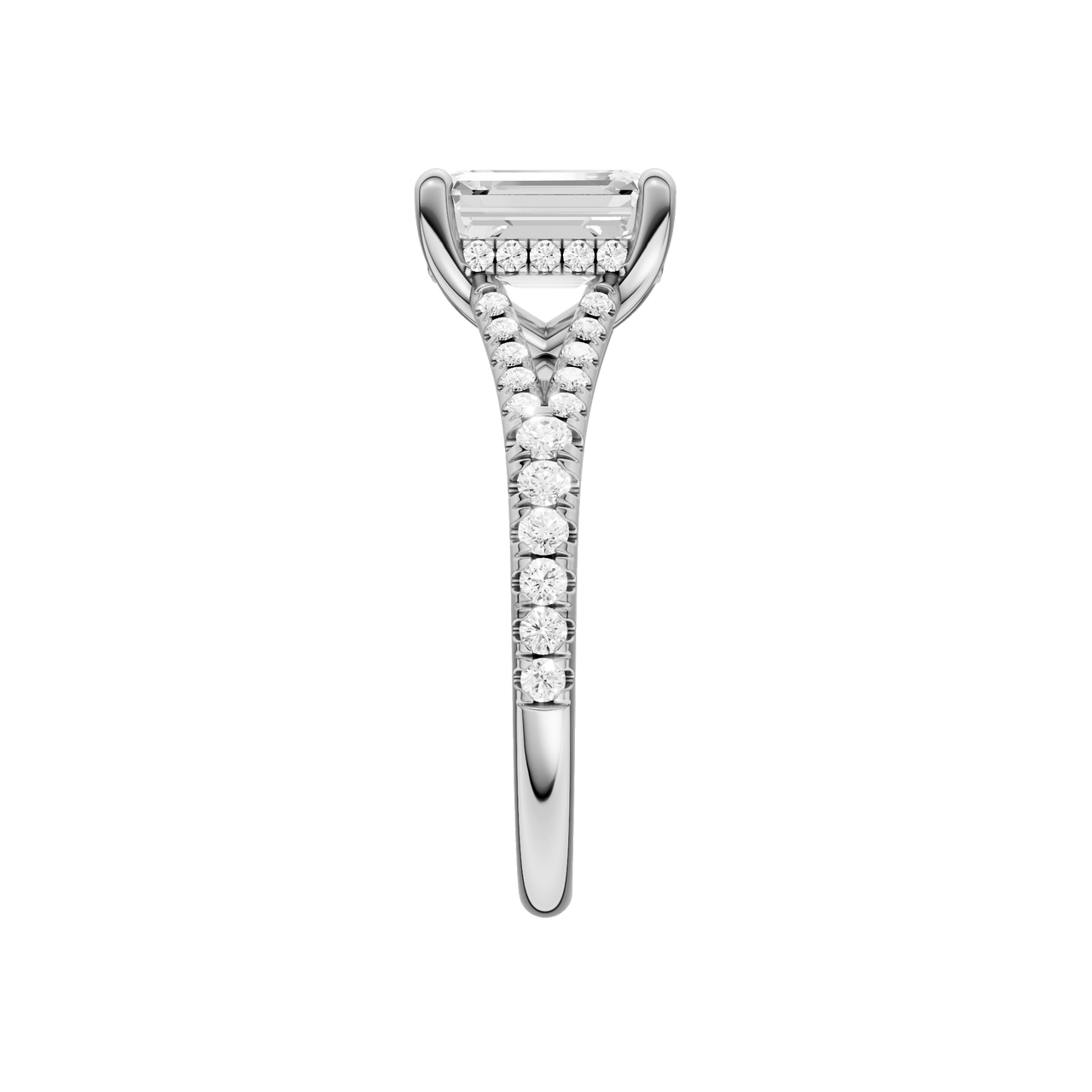A side view of the Emerald cut diamond engagement ring in platinum with a prong diamond band and hidden halo setting