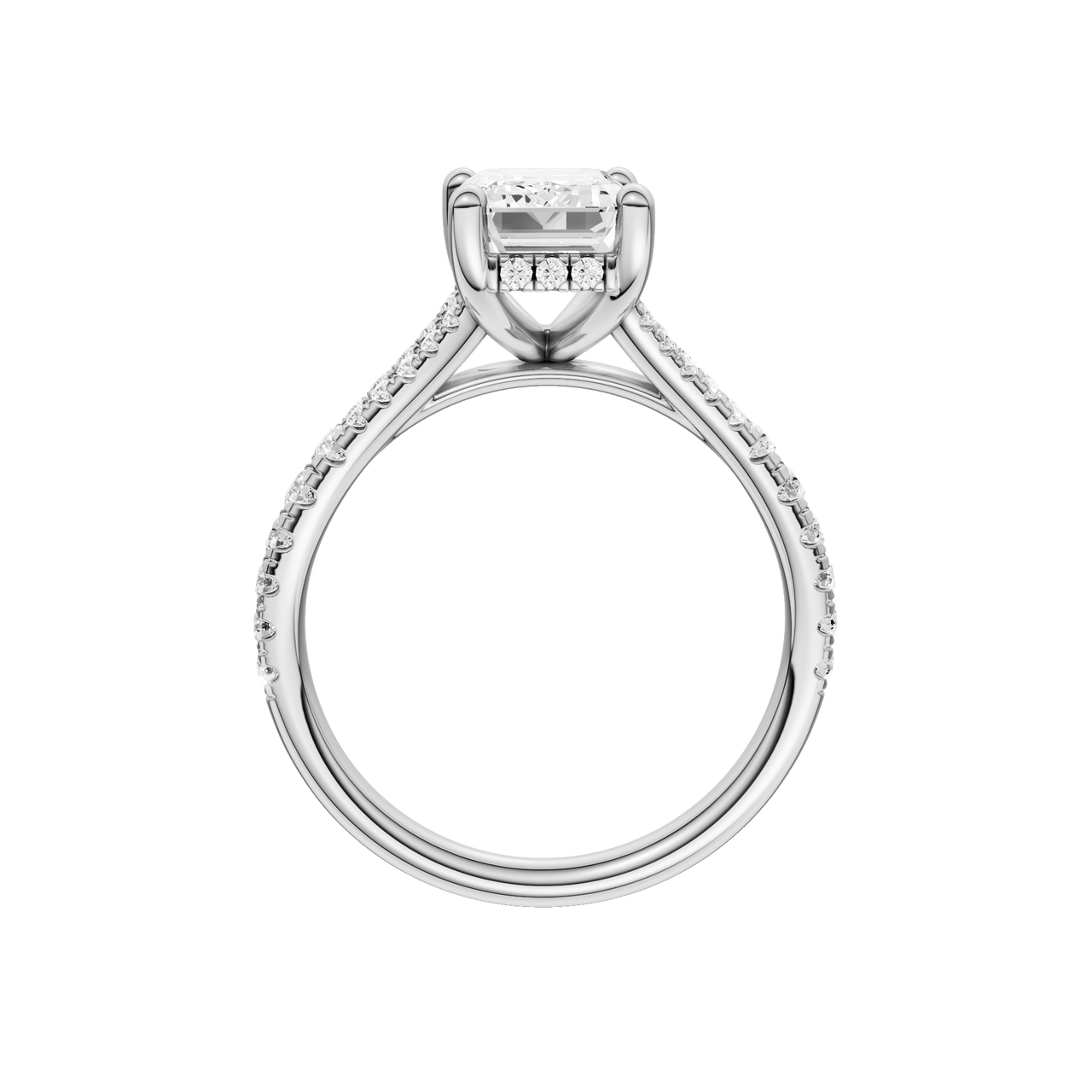 A profile view of the Emerald cut diamond engagement ring in 14k white gold with a prong diamond band and hidden halo setting