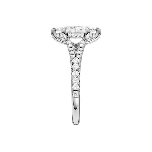 A side view of the Marquise cut diamond engagement ring in 14k white gold with a prong band and hidden halo setting