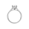 A profile view of the Marquise cut diamond engagement ring in 14k white gold with a prong band and hidden halo setting