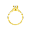 A profile view of the Marquise cut diamond engagement ring in 14k yellow gold with a prong band and hidden halo setting