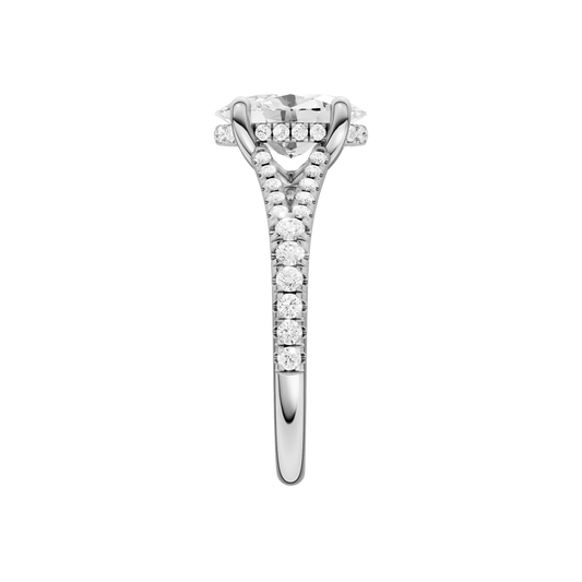 A side view of the Oval cut diamond engagement ring in 14k white gold with a prong band and hidden halo setting