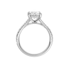 A profile view of the Oval cut diamond engagement ring in 14k white gold with a prong band and hidden halo setting