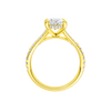 A profile view of the Oval cut diamond engagement ring in 14k yellow gold with a prong band and hidden halo setting