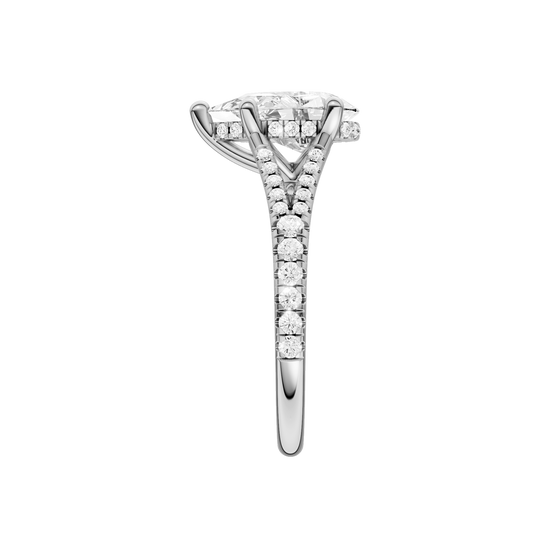 A side view of the Pear cut diamond engagement ring in 14k white gold with a prong band and cathedral setting