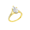 A three-quarter view of the Pear cut diamond engagement ring in 14k yellow gold with a prong band and cathedral setting