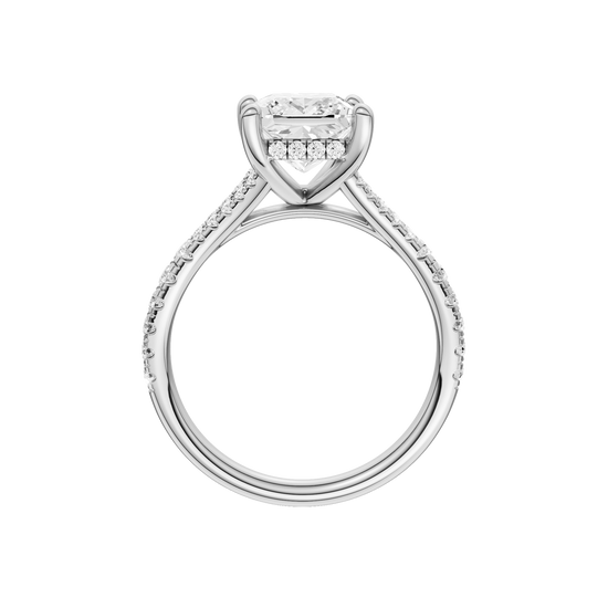 A profile view of the Princess cut diamond engagement ring in 14k white gold with a prong band and hidden halo setting