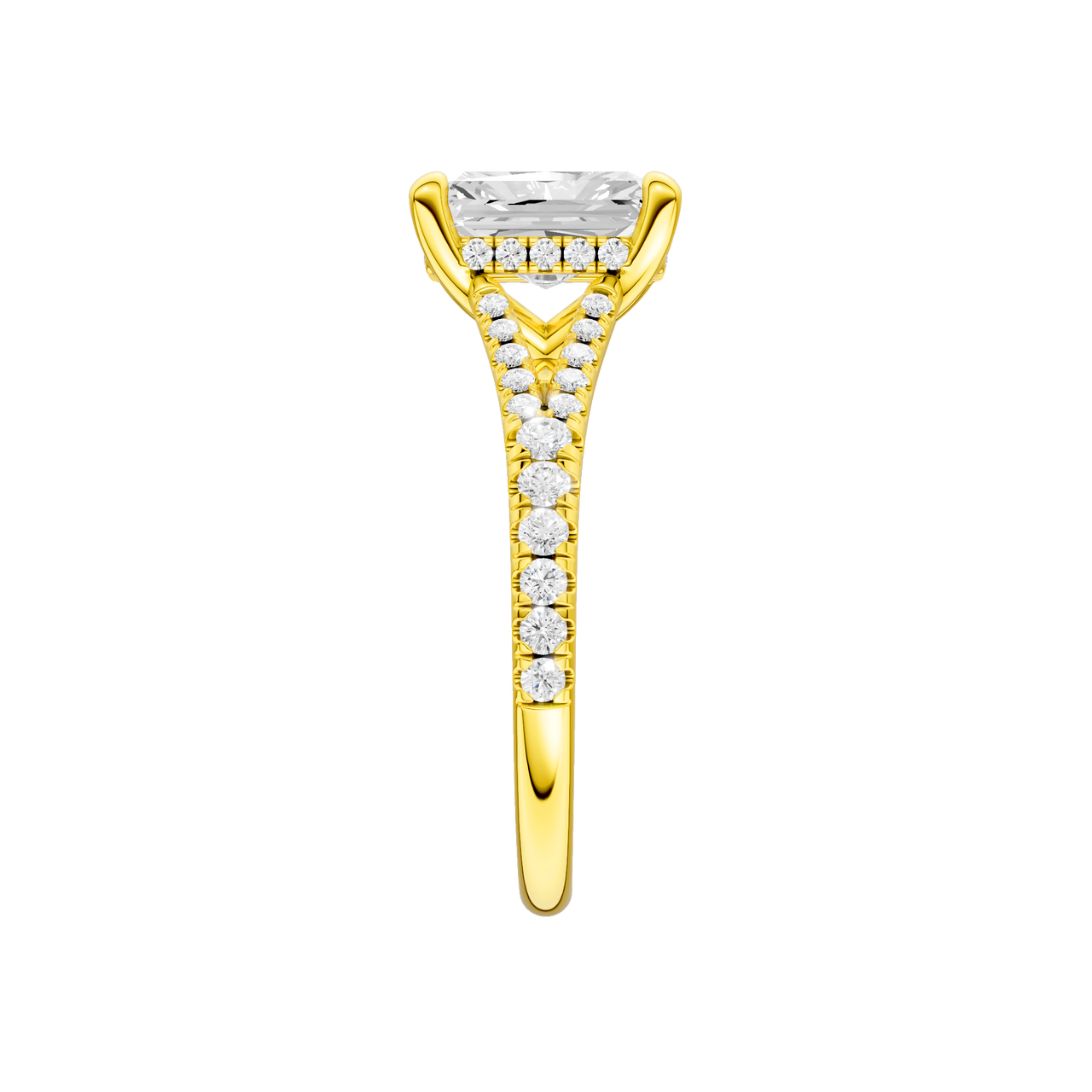 A side view of the Radiant cut diamond engagement ring in 14k yellow gold with a prong band and hidden halo setting