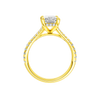 A profile view of the Radiant cut diamond engagement ring in 14k yellow gold with a prong band and hidden halo setting