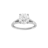A front view of the Round cut diamond engagement ring in platinum with a prong band and hidden halo setting