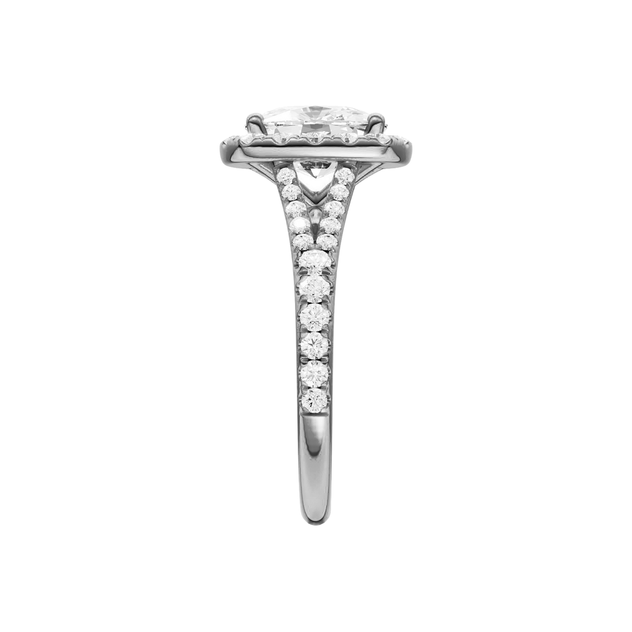 A side view of the Elongated Cushion cut diamond engagement ring in platinum with a prong band and halo setting