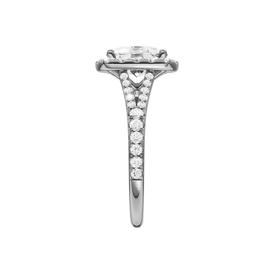A side view of the Elongated Cushion cut diamond engagement ring in 14k white gold with a prong band and halo setting