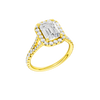 A three-quarter view of the Emerald cut diamond engagement ring in 14k yellow gold with a prong band and solitaire setting