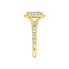 A side view of the Emerald cut diamond engagement ring in 14k yellow gold with a prong band and solitaire setting
