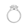 A profile view of the Round cut diamond engagement ring in platinum with a prong diamond band and split setting