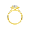 A profile view of the Round cut diamond engagement ring in 14k yellow gold with a prong diamond band and split setting