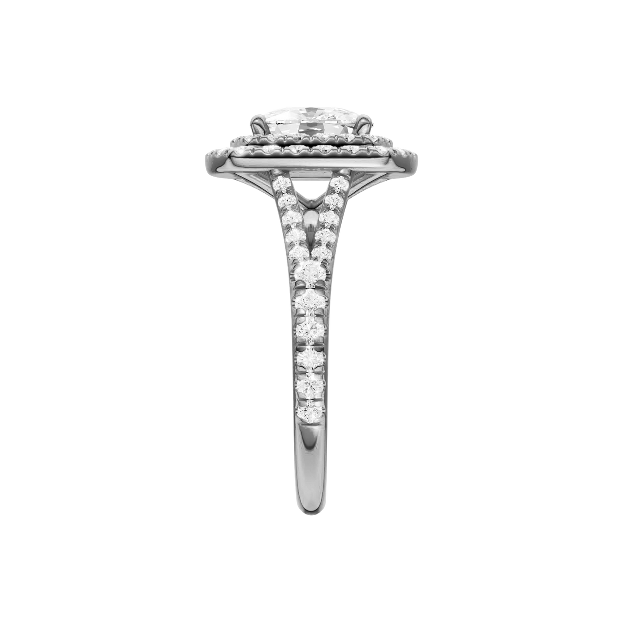A side view of the Elongated cushion cut diamond engagement ring in platinum with a prong diamond band and split setting