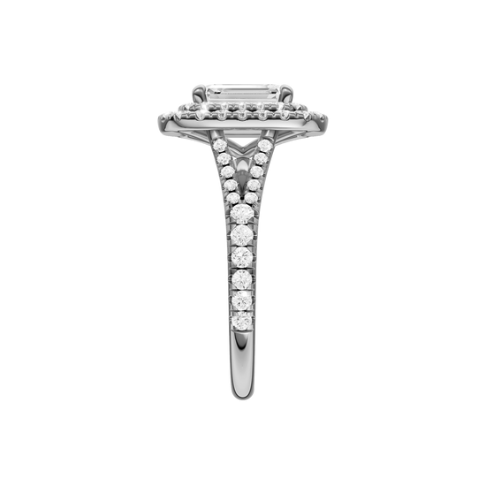 A side view of the Emerald cut diamond engagement ring in platinum with a prong diamond band and split setting