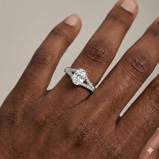 Elongated cushion cut diamond engagement ring in 14k white gold with a diamond channel band and split setting on a hand
