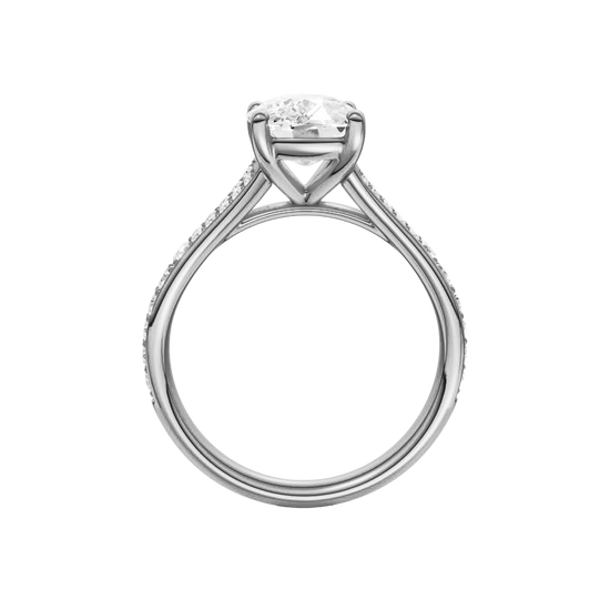 A profile view of the Elongated cushion cut diamond engagement ring in platinum with a diamond channel band and split setting