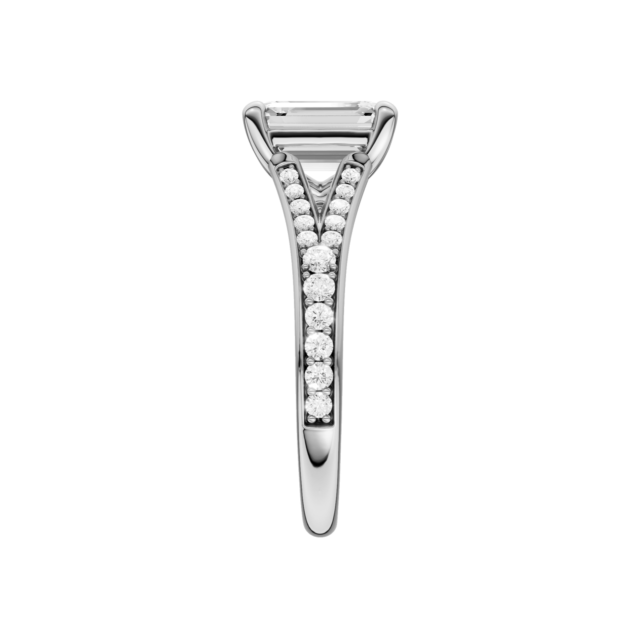 A side view of the Emerald cut diamond engagement ring in 14k white gold with a diamond channel band and split setting