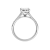 A profile view of the Emerald cut diamond engagement ring in 14k white gold with a diamond channel band and split setting