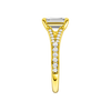 A side view of the Emerald cut diamond engagement ring in 14k yellow gold with a diamond channel band and split setting