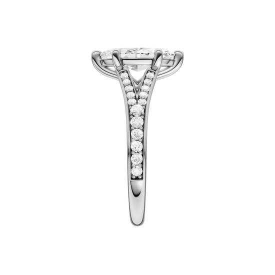 A side view of the Marquise cut diamond engagement ring in 14k white gold with a diamond channel band and split setting