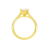 A profile view of the Marquise cut diamond engagement ring in 14k yellow gold with a diamond channel band and split setting