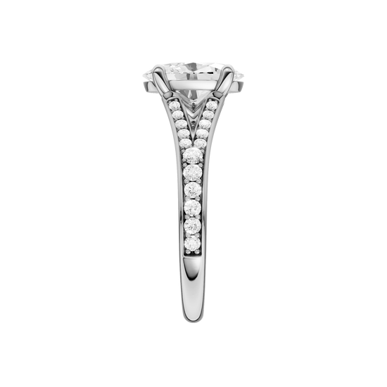A side view of the Oval cut diamond engagement ring in 14k white gold with a diamond channel band and split setting