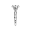 A side view of the Oval cut diamond engagement ring in 14k white gold with a diamond channel band and split setting