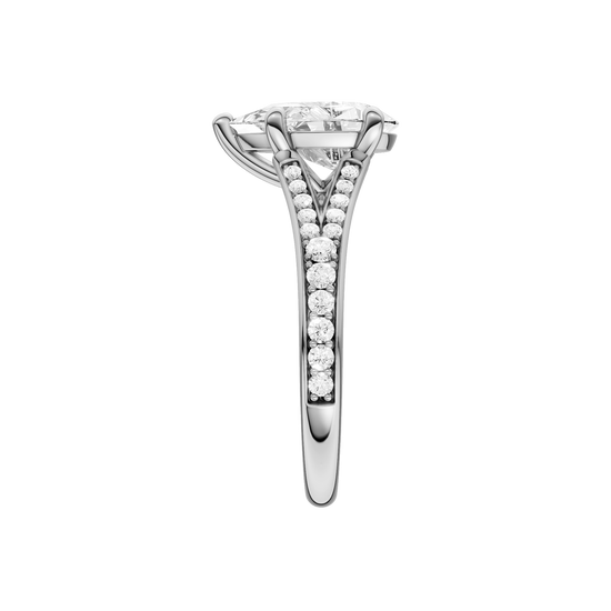 A side view of the Pear cut diamond engagement ring in 14k white gold with a diamond channel band and split setting