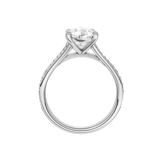 A profile view of the Pear cut diamond engagement ring in platinum with a diamond channel band and split setting