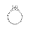 A profile view of the Pear cut diamond engagement ring in platinum with a diamond channel band and split setting