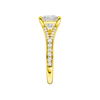 A side view of the Princess cut diamond engagement ring in 14k yellow gold with a diamond channel band and split setting