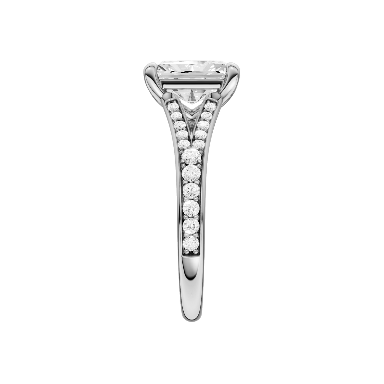 A side view of the Radiant cut diamond engagement ring in 14k white gold with a diamond channel band and split setting