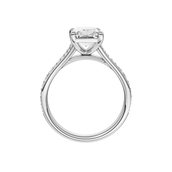 A profile view of the Radiant cut diamond engagement ring in platinum with a diamond channel band and split setting