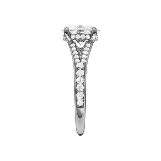 A side view of the Elongated Cushion cut diamond engagement ring in 14k white gold  with a channel band and hidden halo setting