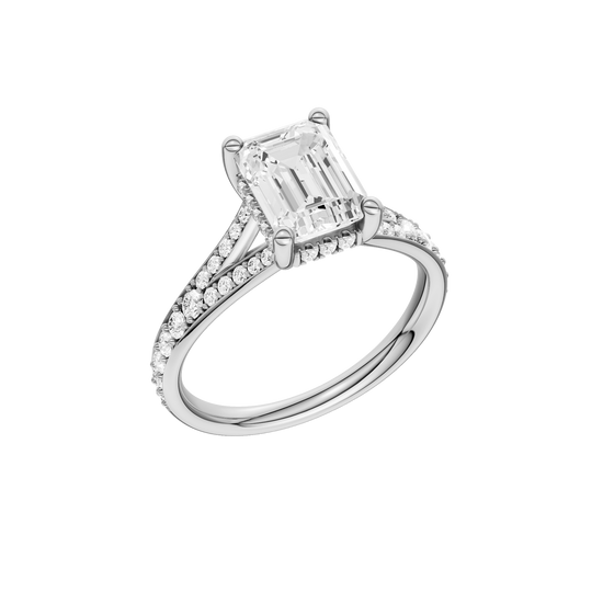 A three-quarter view of the Emerald cut diamond engagement ring in 14k white gold with a diamond channel band and split setting